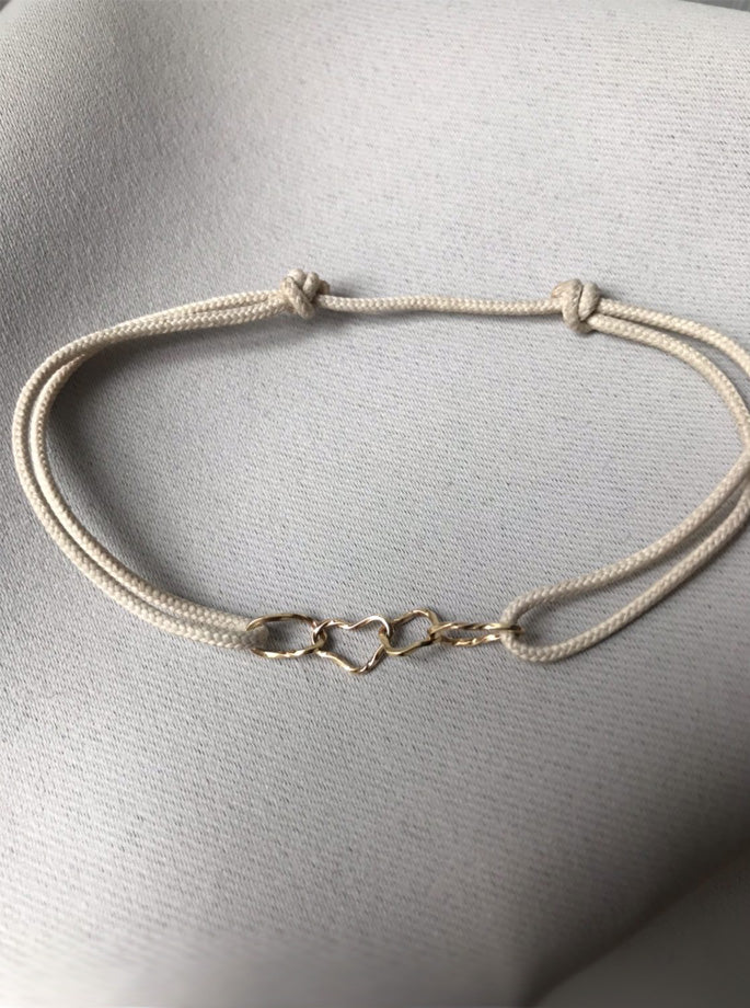Nordenstam - Armbånd med 4 Guld Ringe Råhvid